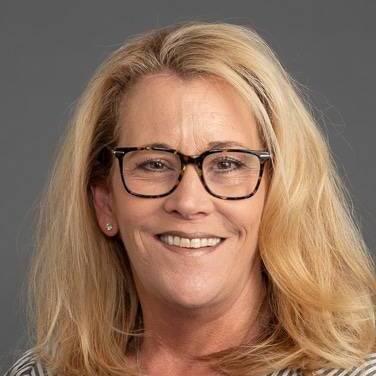 A headshot of Mary McEvilly Hedrick, NP